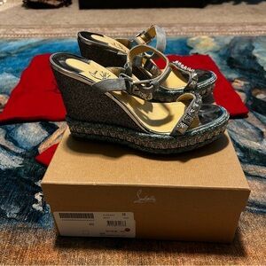 Christian Louboutin Women’s Size 38 wedge sandal.